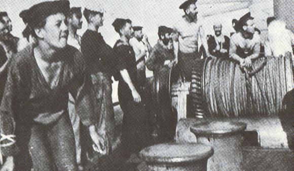 OREGON's crewmen watch the shelling of the COLON at the Battle of Santiago